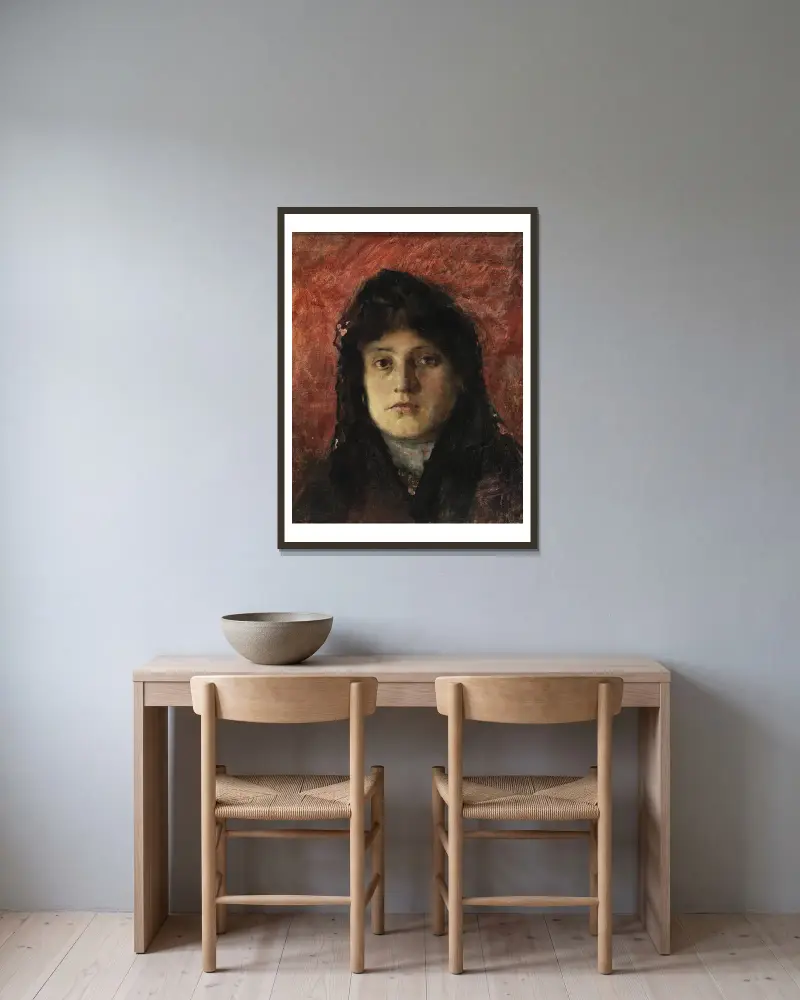 Frauenkopf von Frank Edwin Scott gerahmt an einer Wand