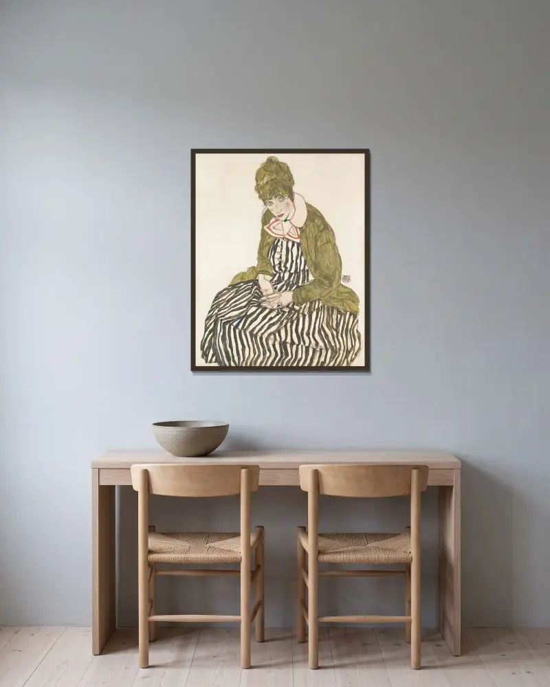 Edith with Striped Dress, Sitting av Egon Schiele inramad på en vägg