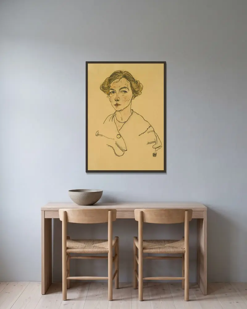 Porträt einer Frau (Lilly Steiner) von Egon Schiele gerahmt an einer Wand