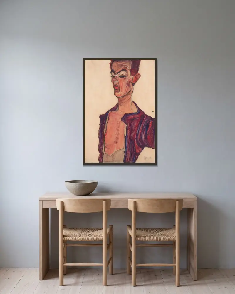 Autoportrét, šklebení, Egon Schiele v rámu na stěně