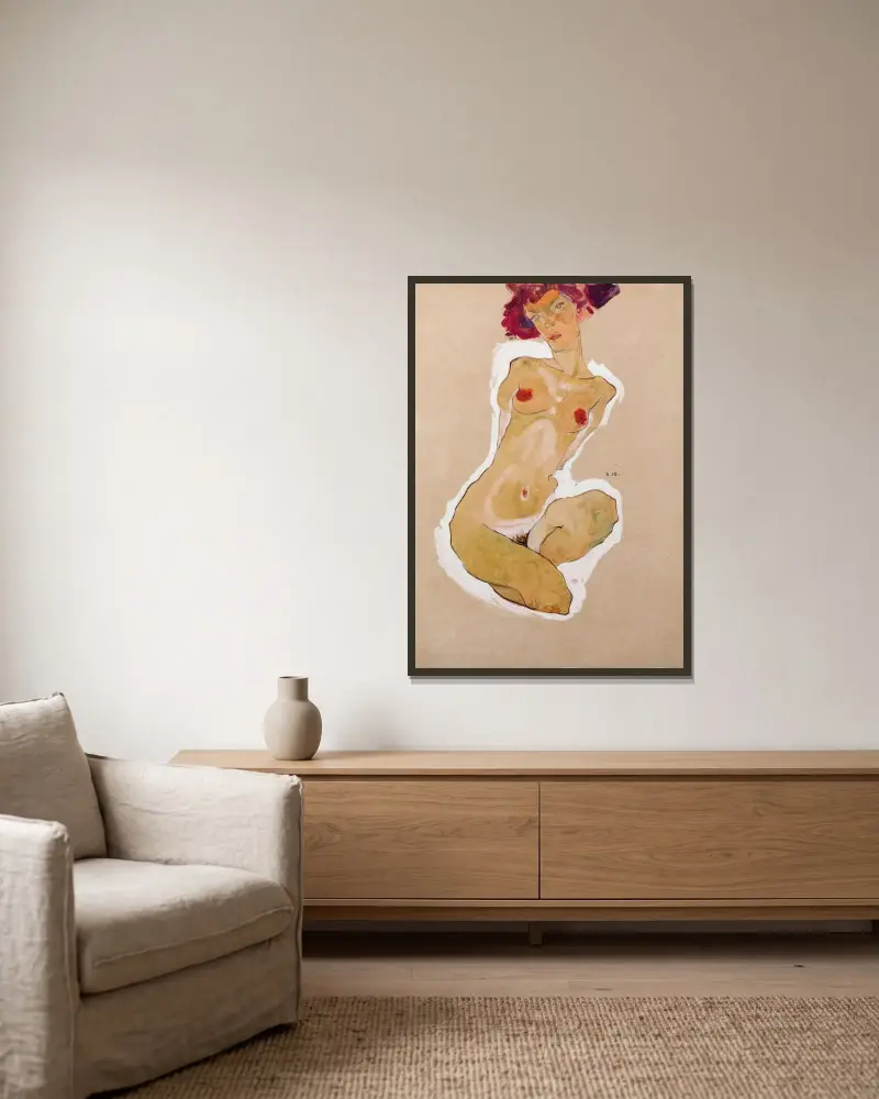 Squatting Female Nude av Egon Schiele inramad på en vägg