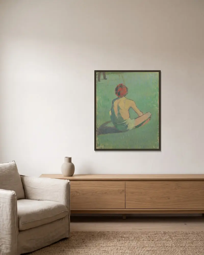 Pojke sittande i gräset av Emile Bernard inramad på en vägg