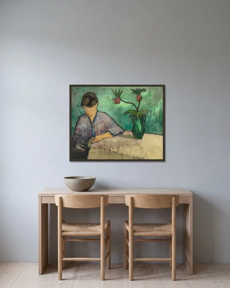 Ung kvinna läsande i kimono av Emile Bernard inramad på en vägg
