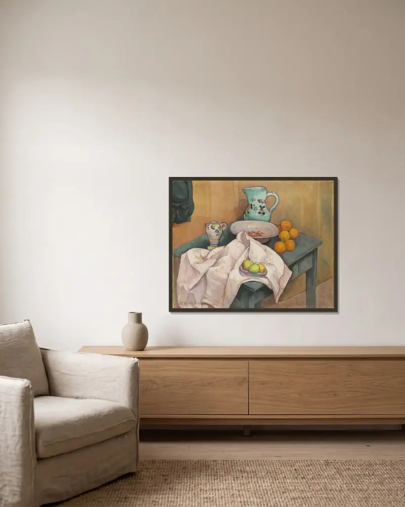 Stilleben med kanna och frukt på utbredd servett av Emile Bernard inramad på en vägg