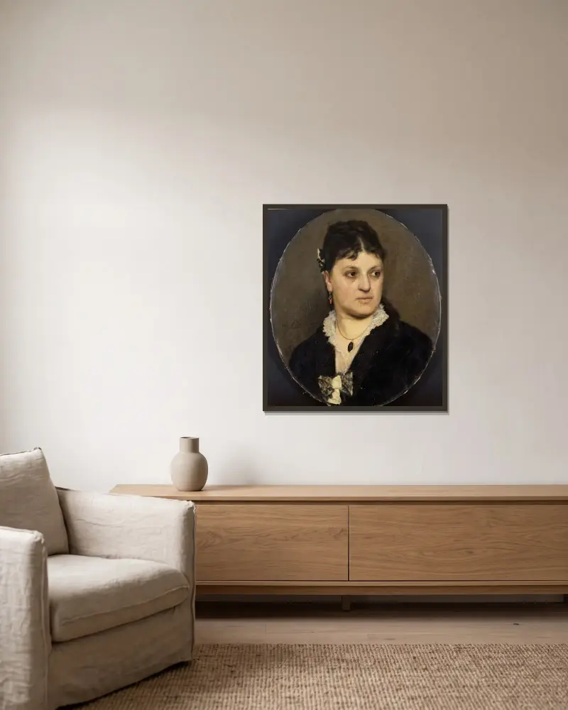 Porträtt av konstnären Marie Moreels av Emile Claus inramad på en vägg