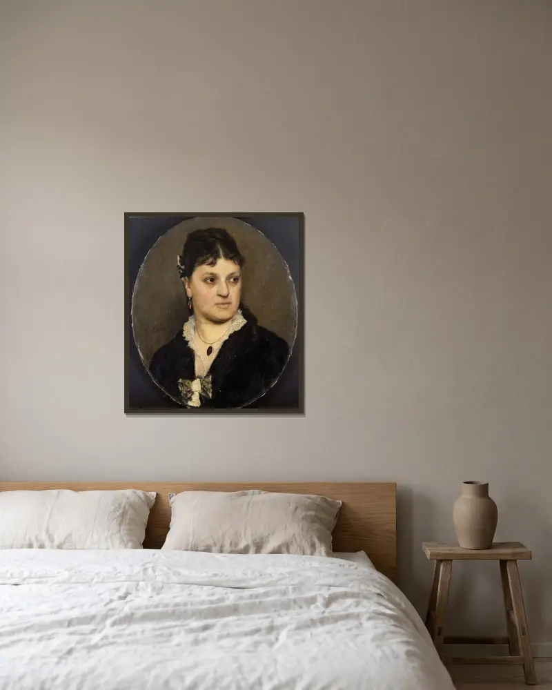 Porträtt av konstnären Marie Moreels av Emile Claus inramad på en vägg