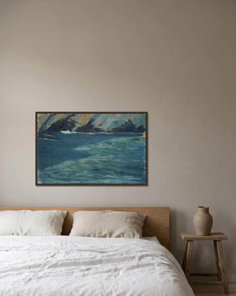 Klippkust och lugnt hav av Ernst Schiess inramad på en vägg