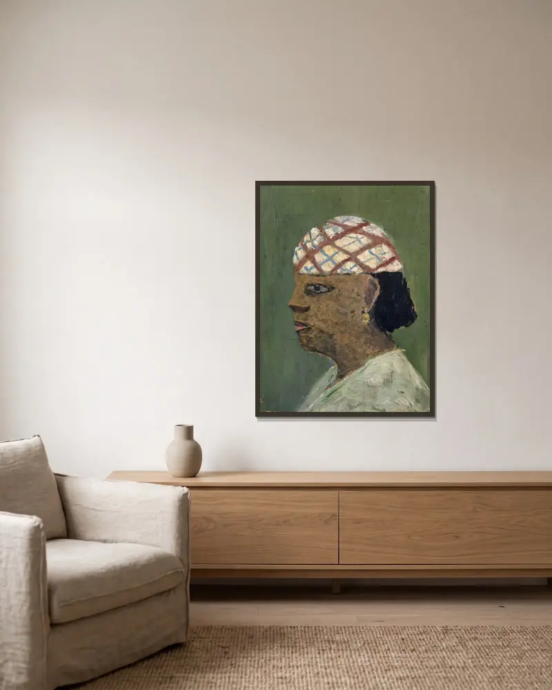 Head of a Woman of the Sudan av Ernst Schiess inramad på en vägg