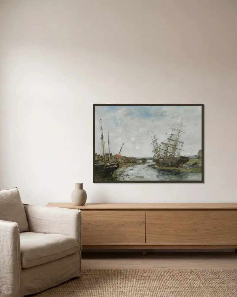 La Touques vid lågvatten av Eugène Boudin inramad på en vägg