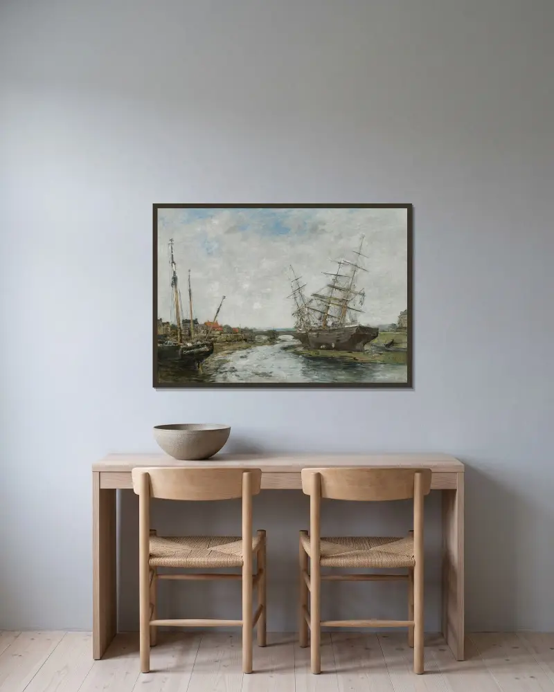 La Touques vid lågvatten av Eugène Boudin inramad på en vägg