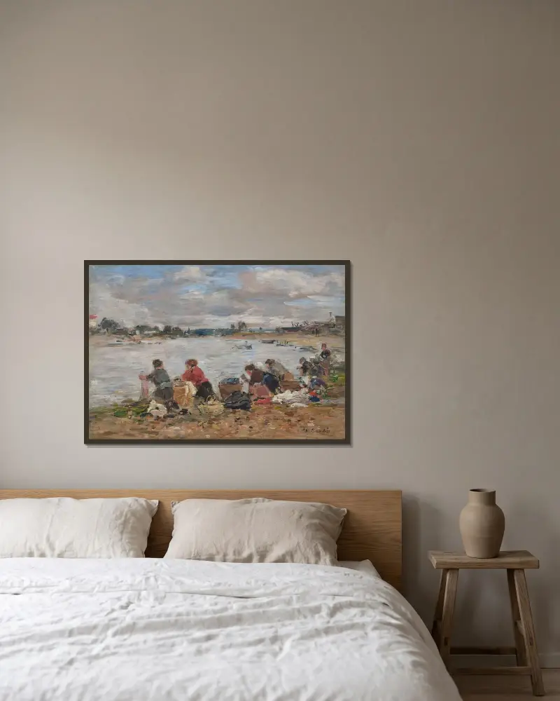 Kvinnor som tvättar vid Touques strand av Eugène Boudin inramad på en vägg