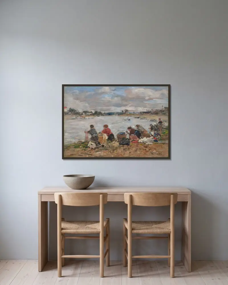 Kvinnor som tvättar vid Touques strand av Eugène Boudin inramad på en vägg