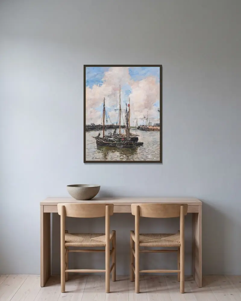 Inloppet till Trouvilles hamn av Eugène Boudin inramad på en vägg