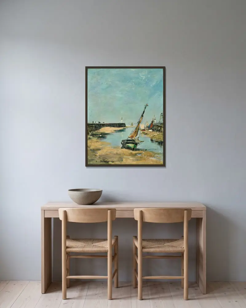 Trouville, pirerna vid lågvatten av Eugène Boudin inramad på en vägg
