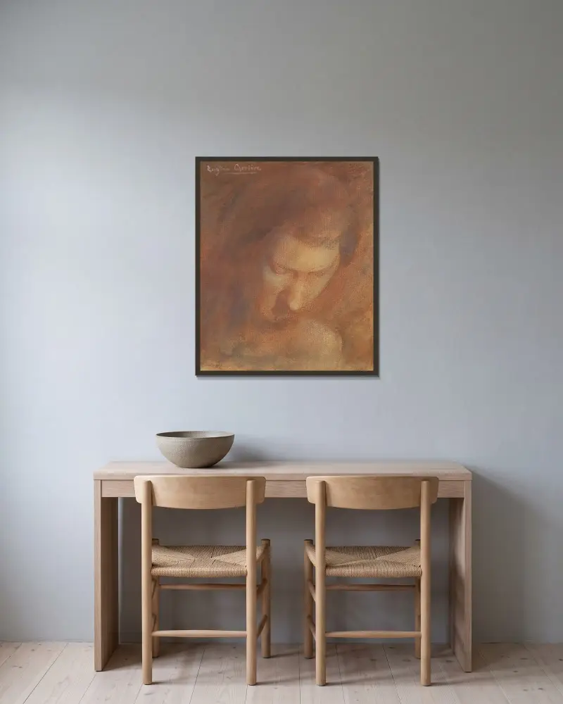 A portrait av Eugène Carriere inramad på en vägg