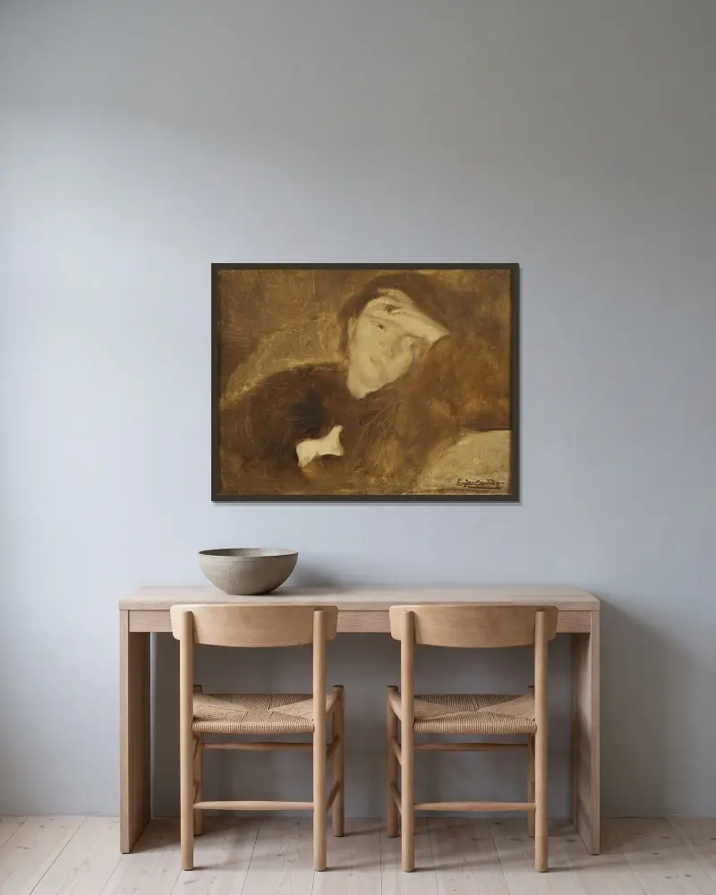 Porträtt av en dam. Studie av Eugène Carriere inramad på en vägg