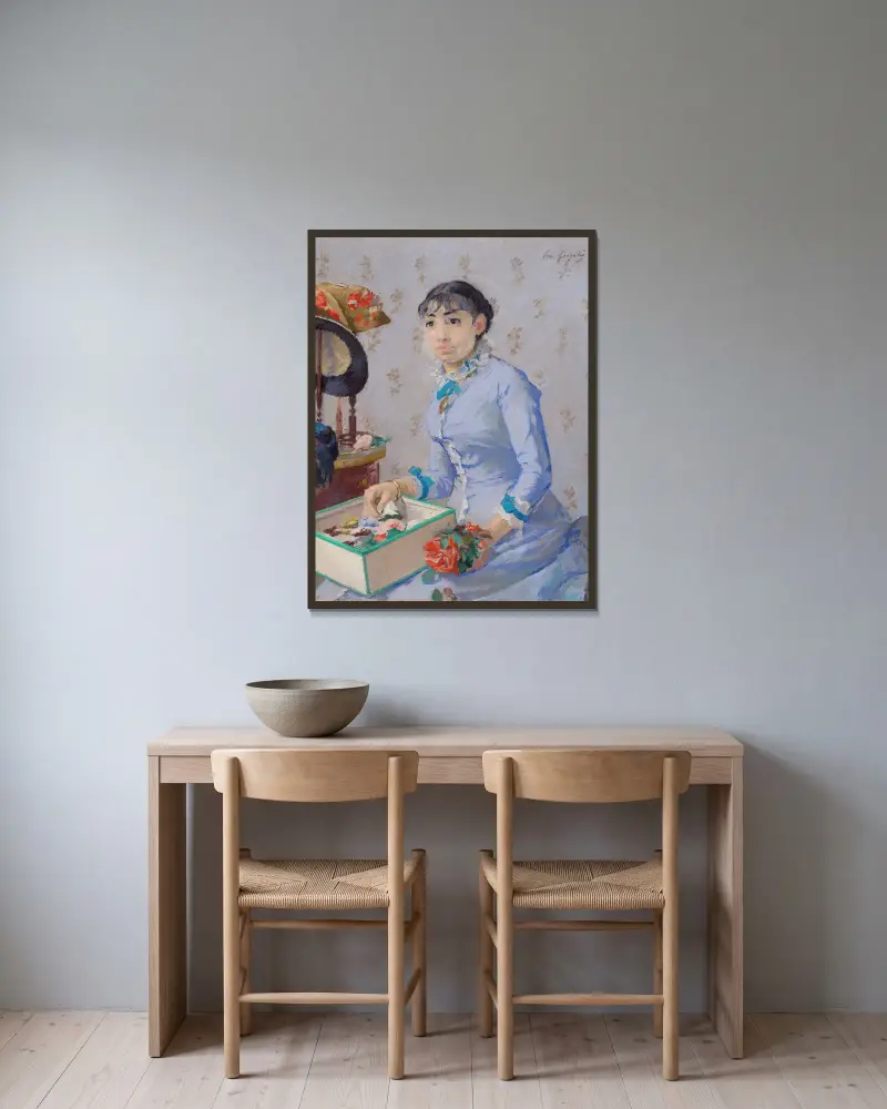 Modistens butik, Eva Gonzalès v rámu na stěně