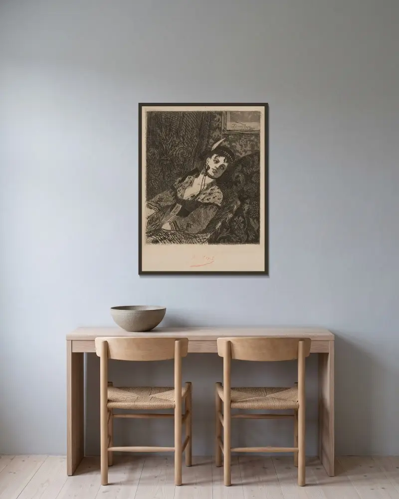 Kvinna med skotsk hatt av Félicien Rops inramad på en vägg