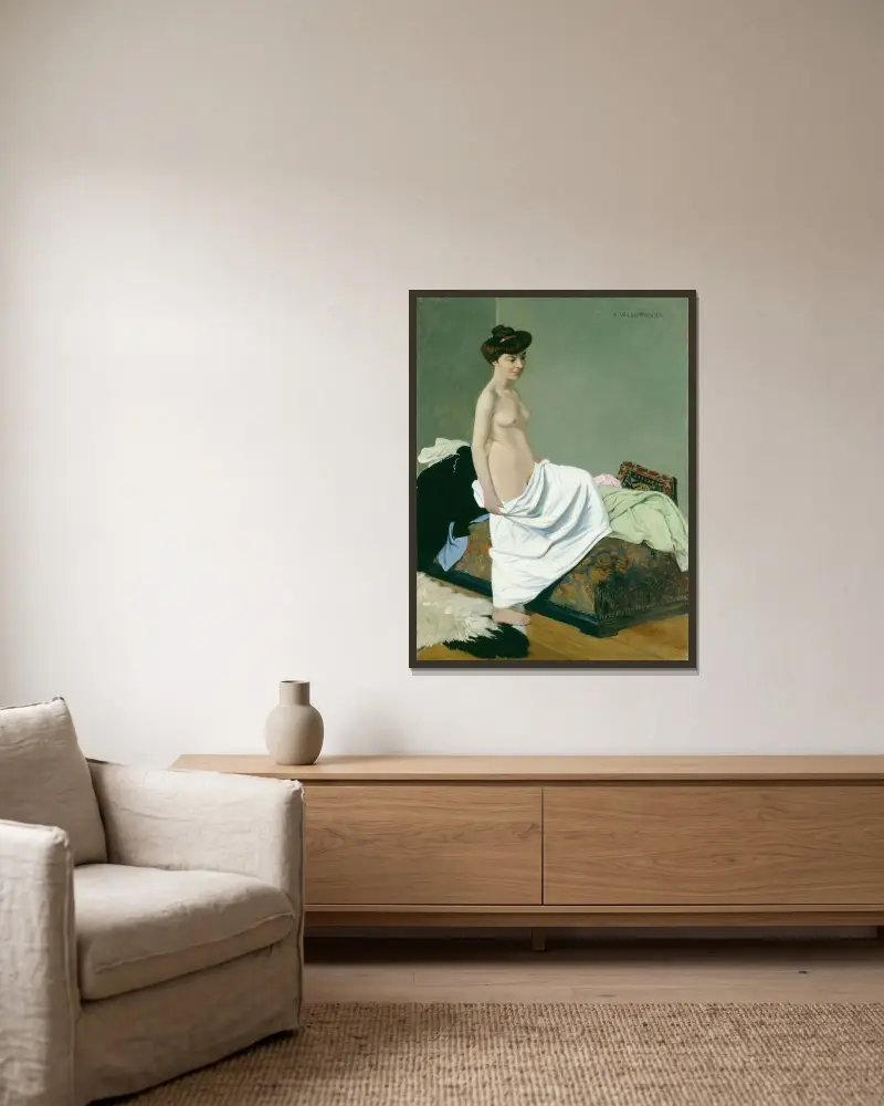 Stående naken kvinna med klänning på knät av Félix Vallotton inramad på en vägg