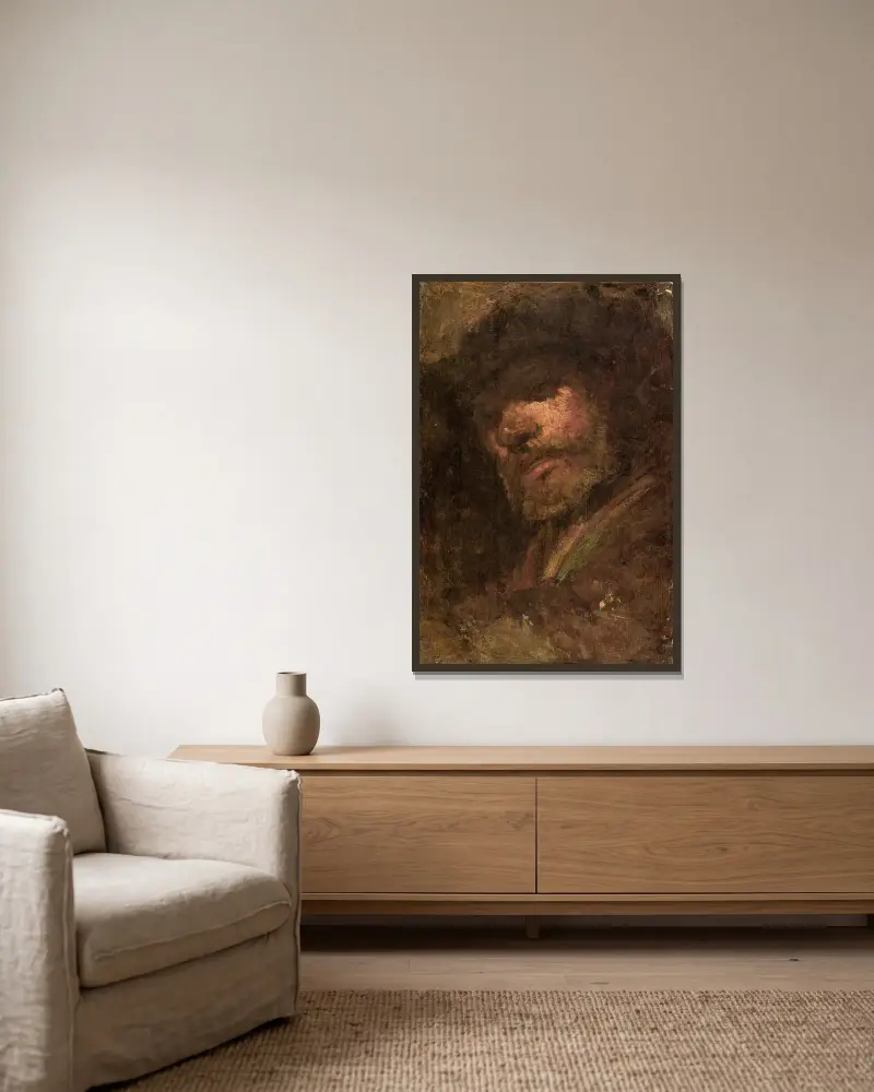 Trumslagaren, manshuvud efter Rembrandt av Félix Ziem inramad på en vägg