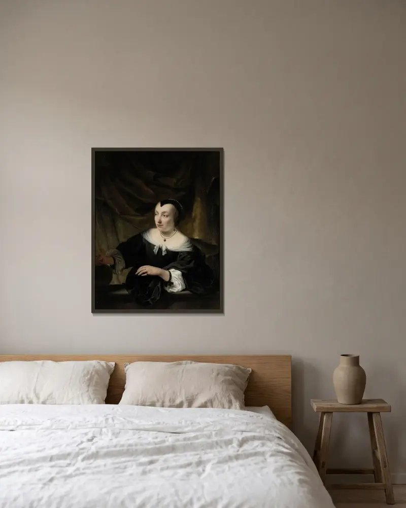 Porträtt av Elisabeth Dell av Ferdinand Bol inramad på en vägg