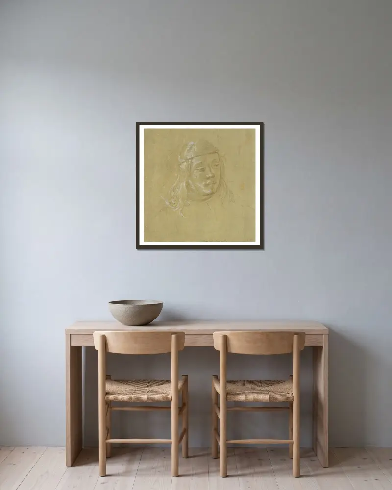 Bildnisstudie eines jungen Mannes av Filippino Lippi inramad på en vägg