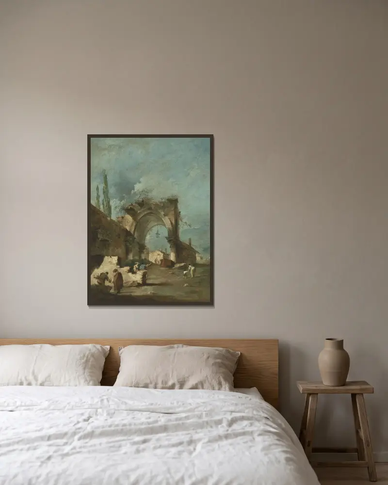 Capriccio med byggnader och figurer vid en raserad valvbåge av Francesco Guardi inramad på en vägg