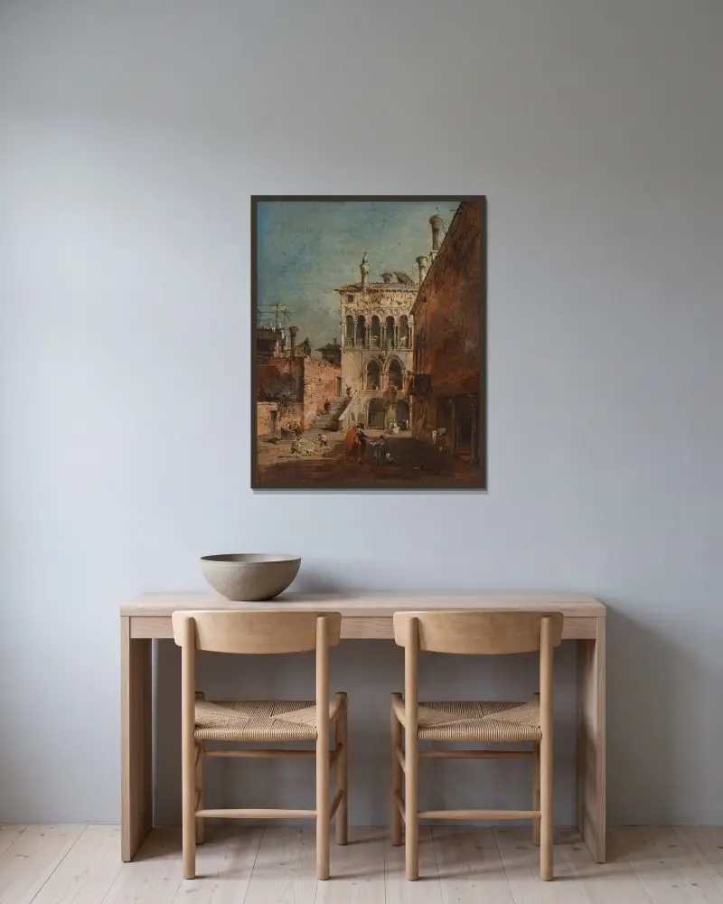 Arkitektonisk capriccio med en campiello av Francesco Guardi inramad på en vägg