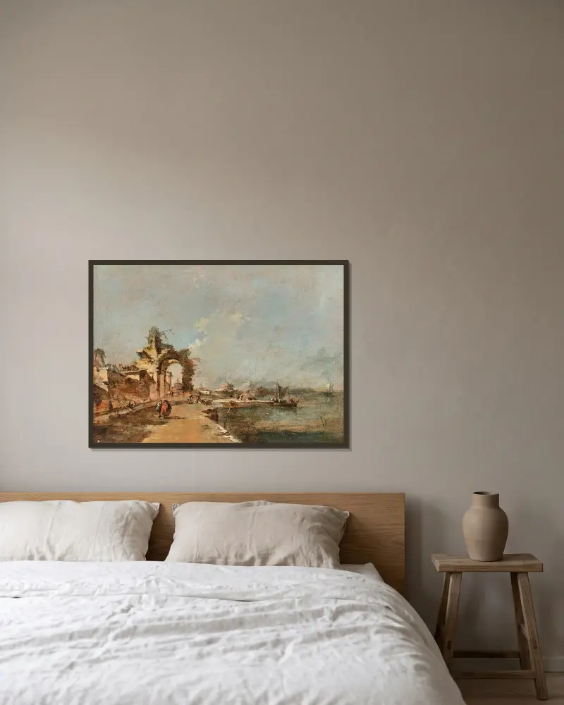 Capriccio över en lagun med figurer och en raserad båge av Francesco Guardi inramad på en vägg