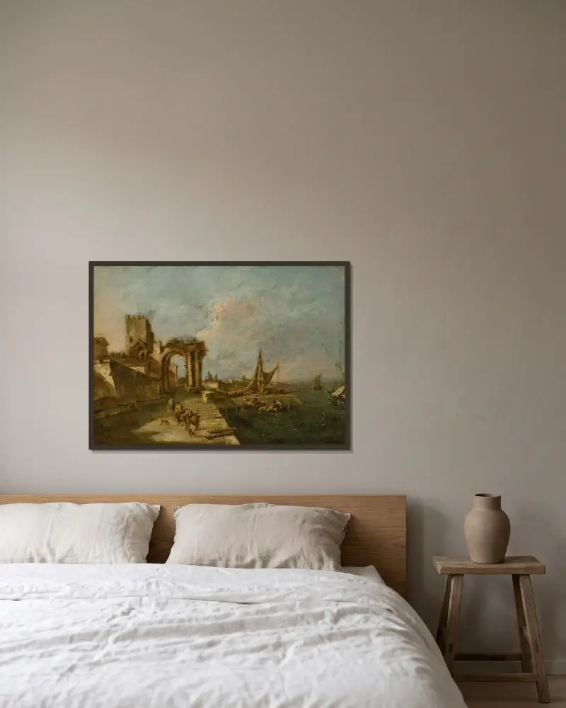 Capriccio med en ruinerad båge, ett torn bortom och en hamn med båtar och små fartyg, en kupolkyrka i fjärran av Francesco Guardi inramad på en vägg