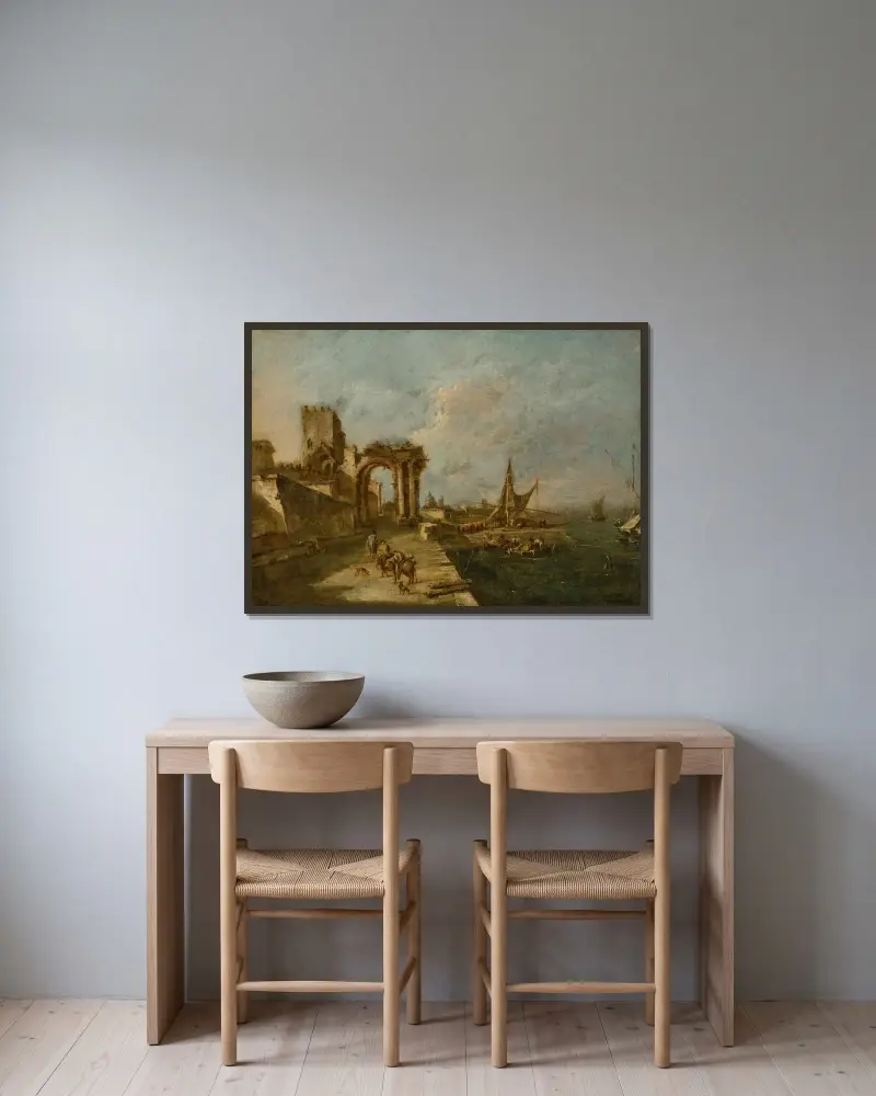 Capriccio med en ruinerad båge, ett torn bortom och en hamn med båtar och små fartyg, en kupolkyrka i fjärran av Francesco Guardi inramad på en vägg