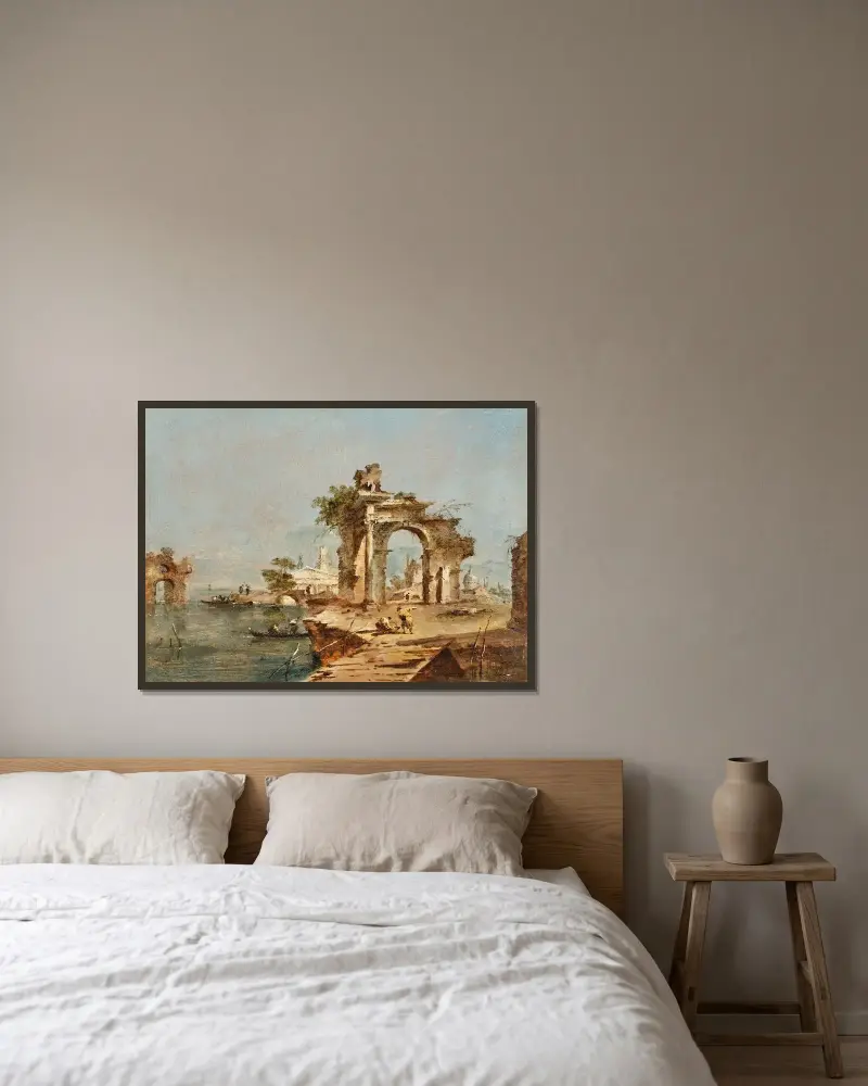 Capriccio med figurer vid en lagun, en ruinerad båge och ett tempel bortom av Francesco Guardi inramad på en vägg