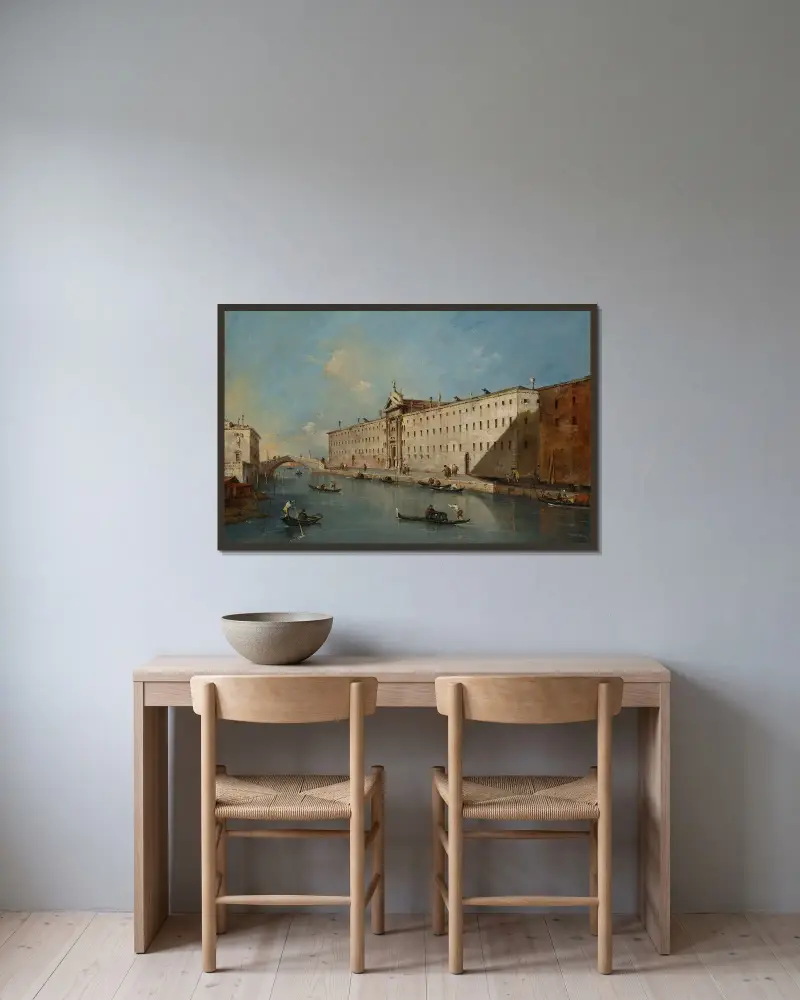 Venedig, kanalen Rio dei Mendicanti mot norr med kyrkan San Lazzaro dei Mendicanti av Francesco Guardi inramad på en vägg
