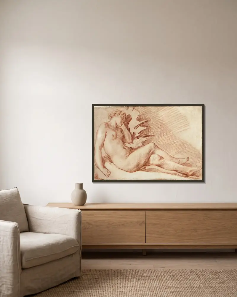 Liggande kvinnlig nakenstudie av François Boucher inramad på en vägg