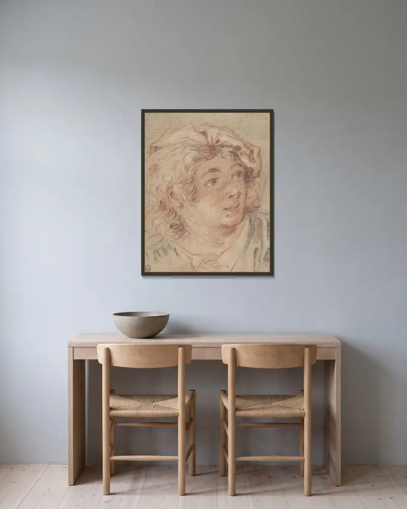 Ung man med basker av François Boucher inramad på en vägg