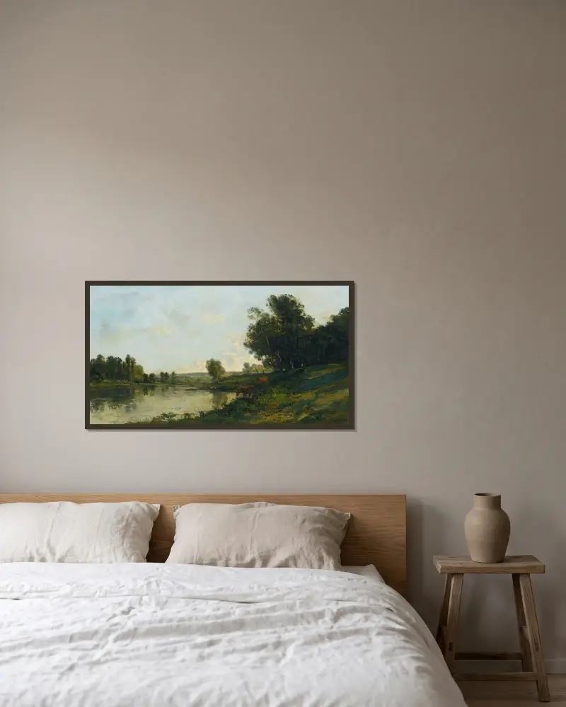 Flodstranden av Charles François Daubigny inramad på en vägg