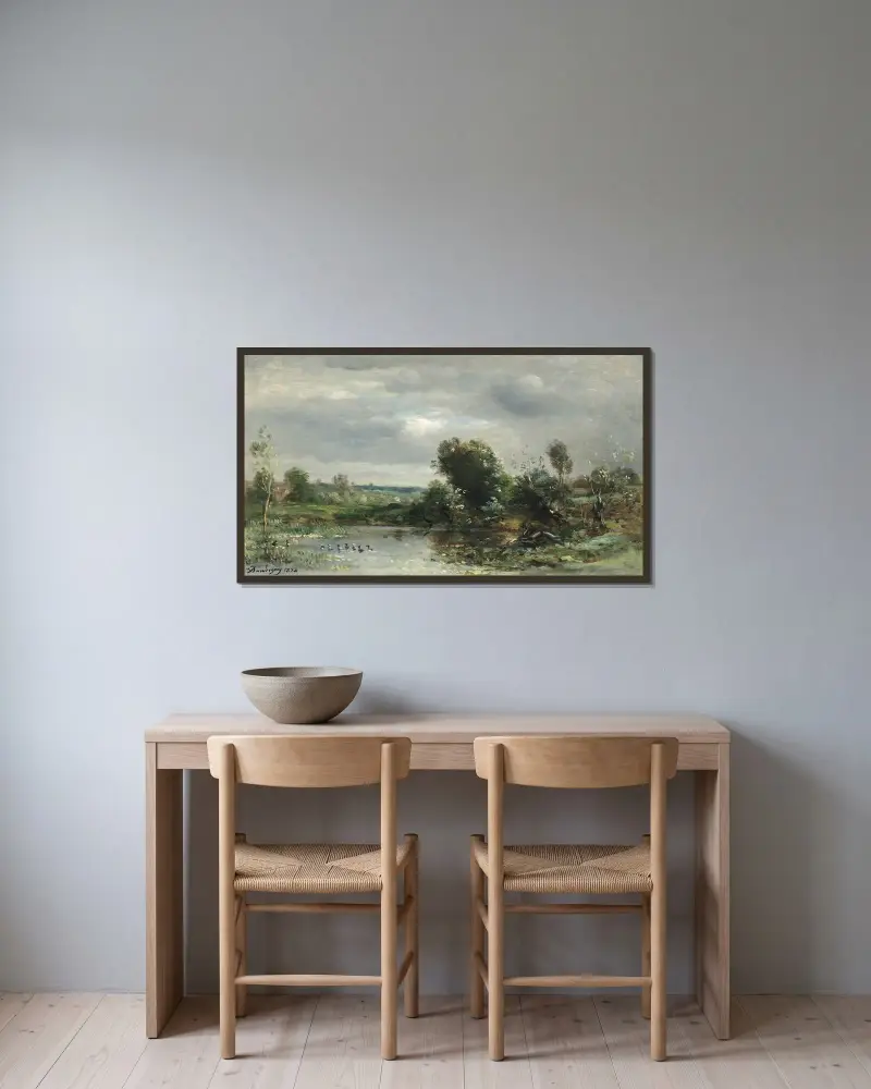 Ällingar på en sjö av Charles François Daubigny inramad på en vägg