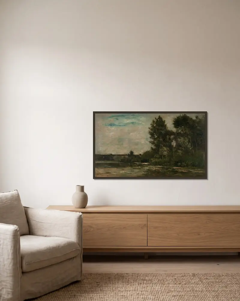 Flodlandskap av Charles François Daubigny inramad på en vägg