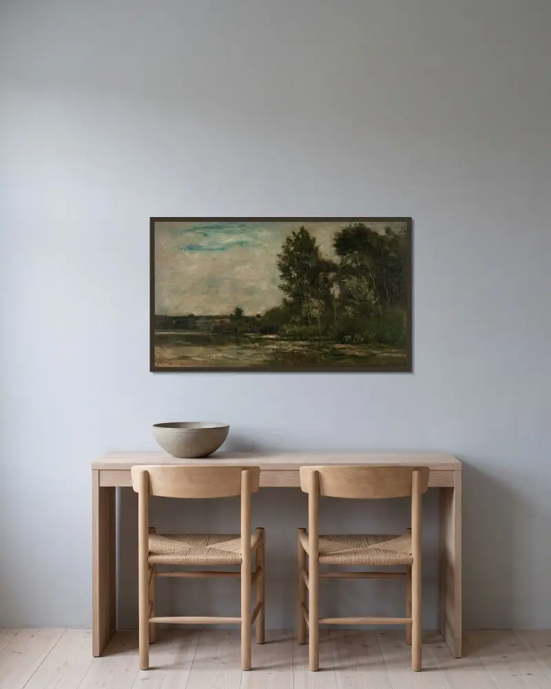 Flodlandskap av Charles François Daubigny inramad på en vägg