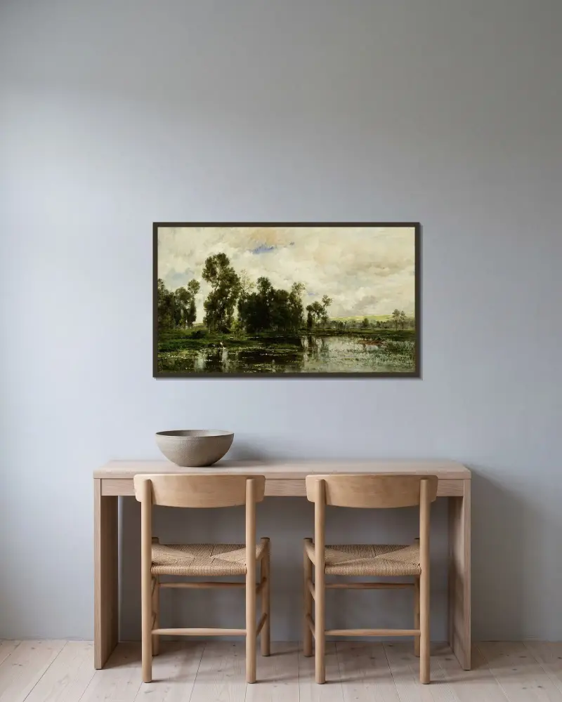 Vid dammens kant av Charles François Daubigny inramad på en vägg