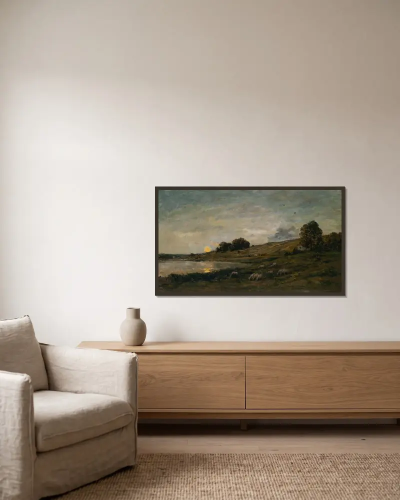 Fårflock vid flodstranden av Charles François Daubigny inramad på en vägg