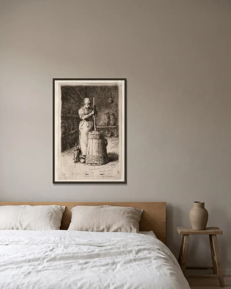 Eine butternde Frau von Jean-François Millet gerahmt an einer Wand