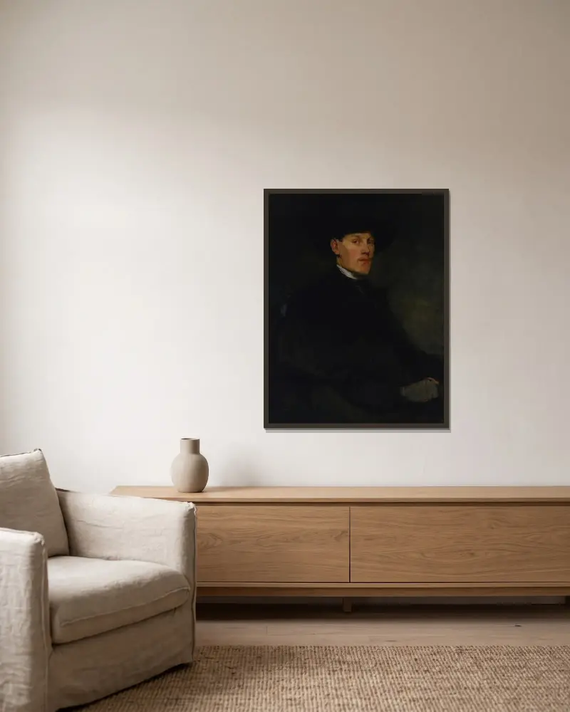 Porträtt av en ung man av Frank Duveneck inramad på en vägg