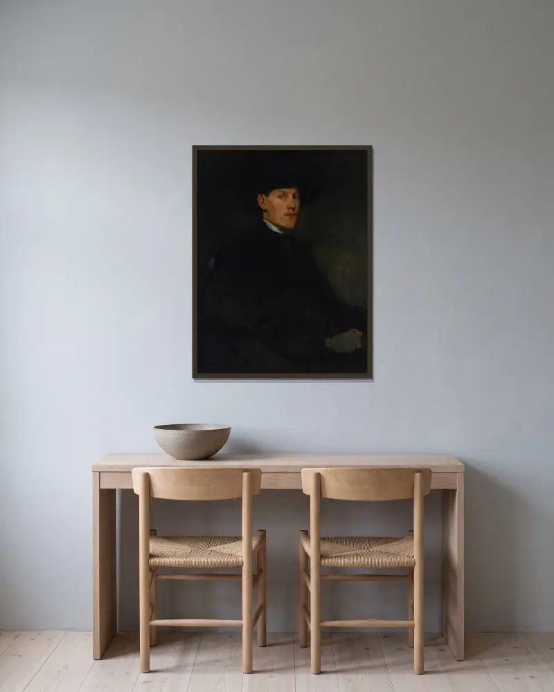Porträtt av en ung man av Frank Duveneck inramad på en vägg