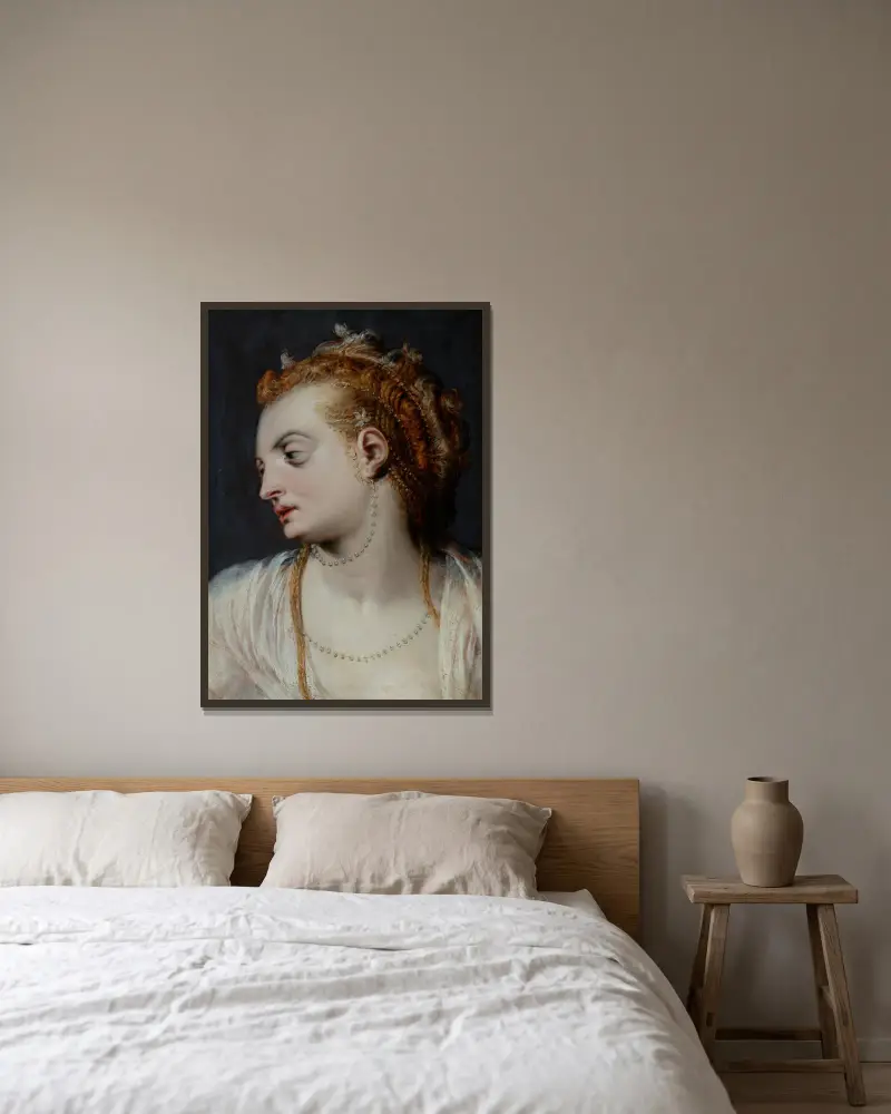 Studie hlavy mladé ženy v bílém av Frans Floris inramad på en vägg