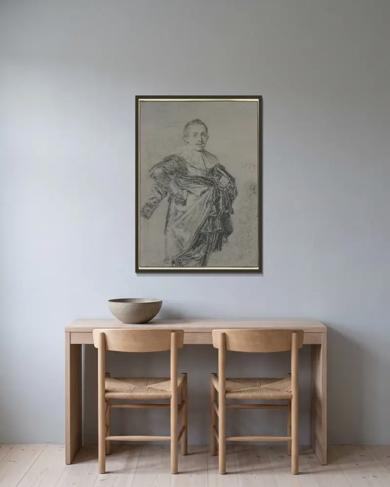 Junger stehender Mann mit Mantel und glatter Halskrause, Kniestück av Frans Hals inramad på en vägg