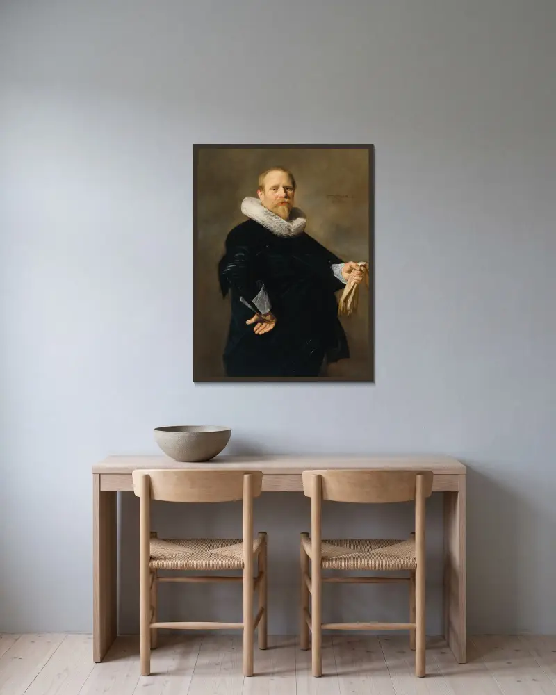 Portrait of a Man – nr 1 av Frans Hals inramad på en vägg