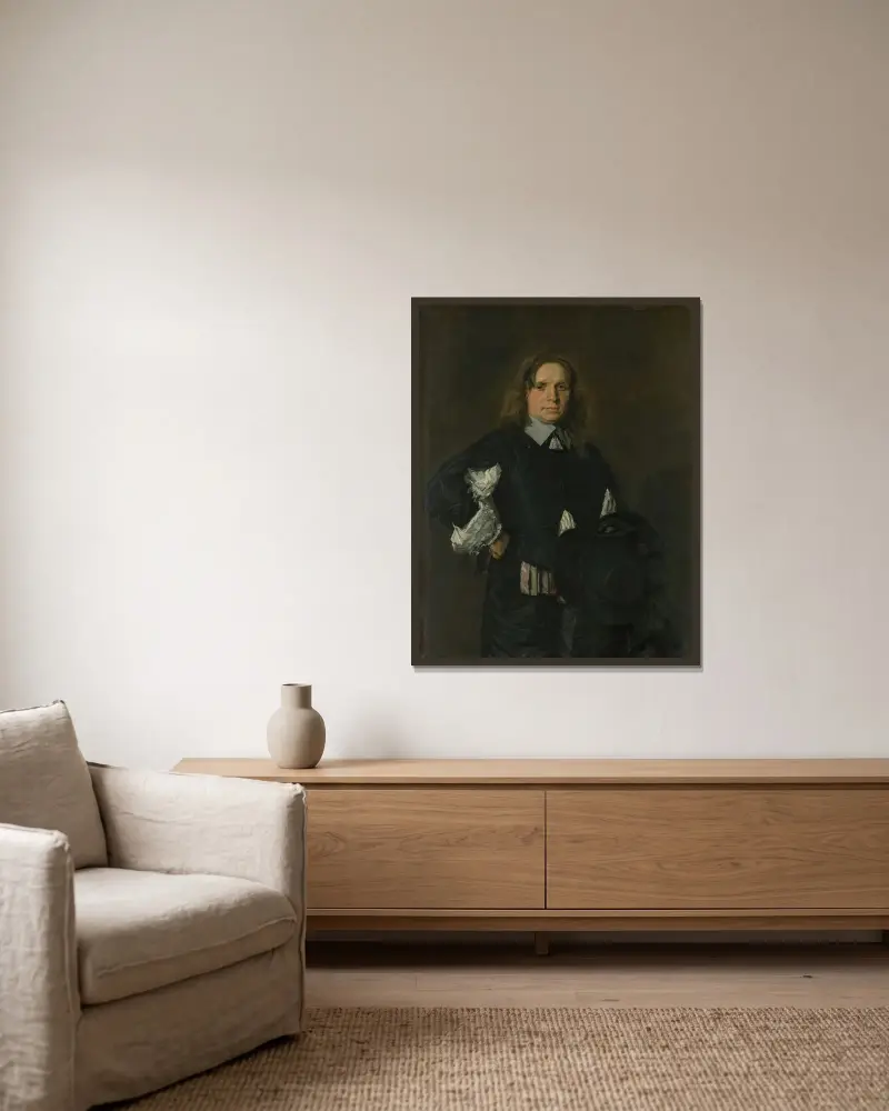 Portrait of a Man – nr 3 av Frans Hals inramad på en vägg