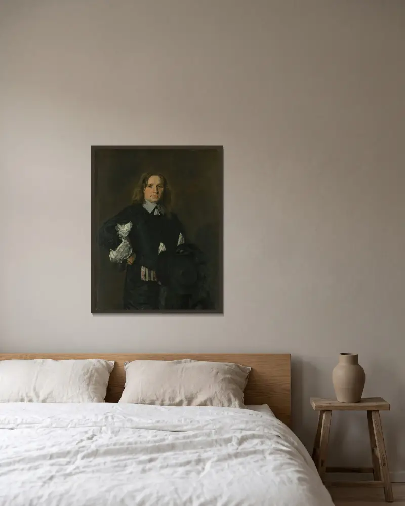 Portrait of a Man – nr 3 av Frans Hals inramad på en vägg