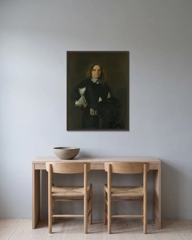 Portrait of a Man – nr 3 av Frans Hals inramad på en vägg